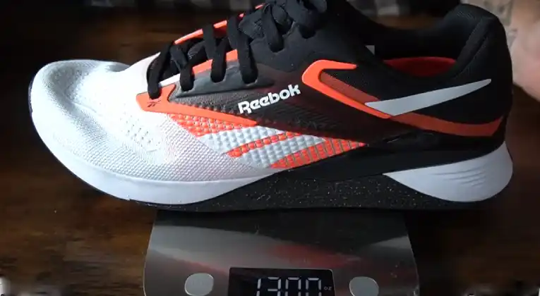 Our trainer testing the reebok nano x4 weight is proper or not.