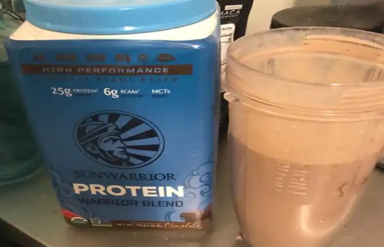  a container of the Sunwarrior warrior protein powder which is used in a smoothie.
